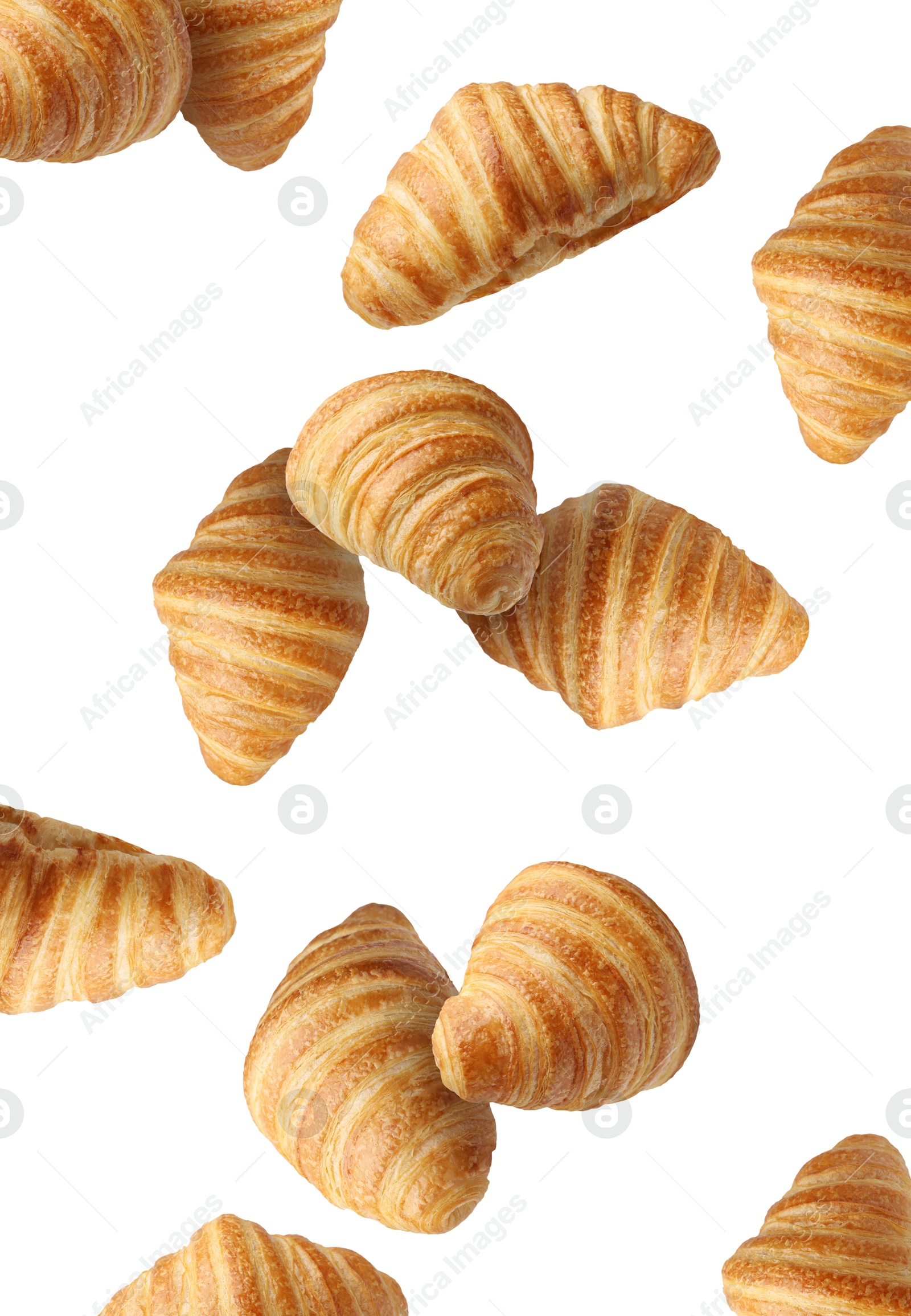 Image of Delicious croissants in air on white background. Puff pastry