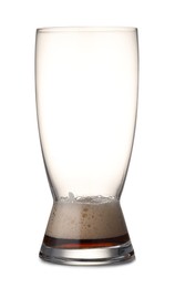 Photo of Almost empty glass of beer isolated on white