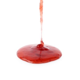 Photo of Pouring delicious strawberry sauce on white background, closeup