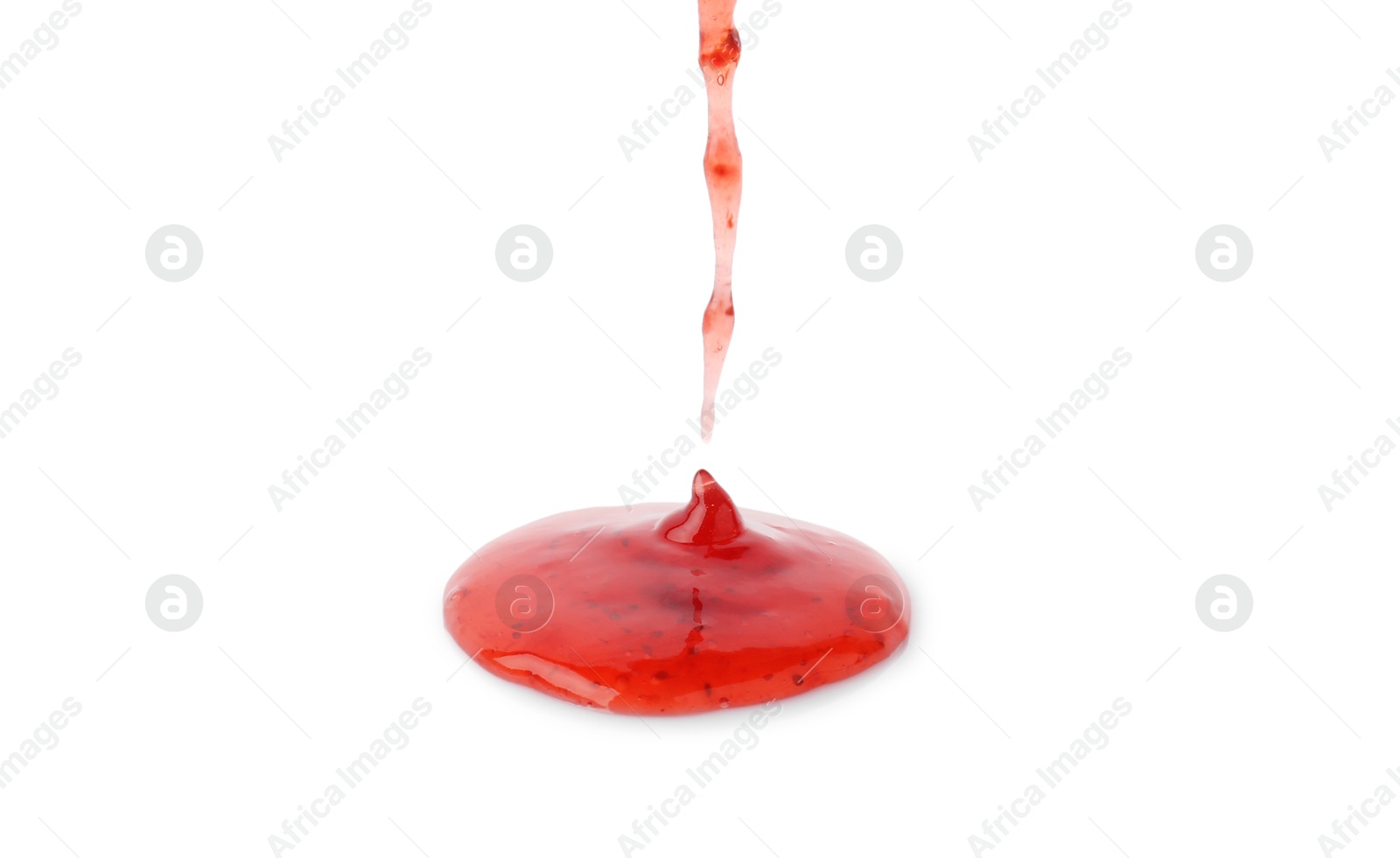 Photo of Pouring delicious strawberry sauce on white background, closeup