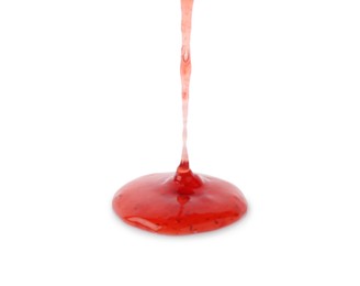 Photo of Pouring delicious strawberry sauce on white background, closeup