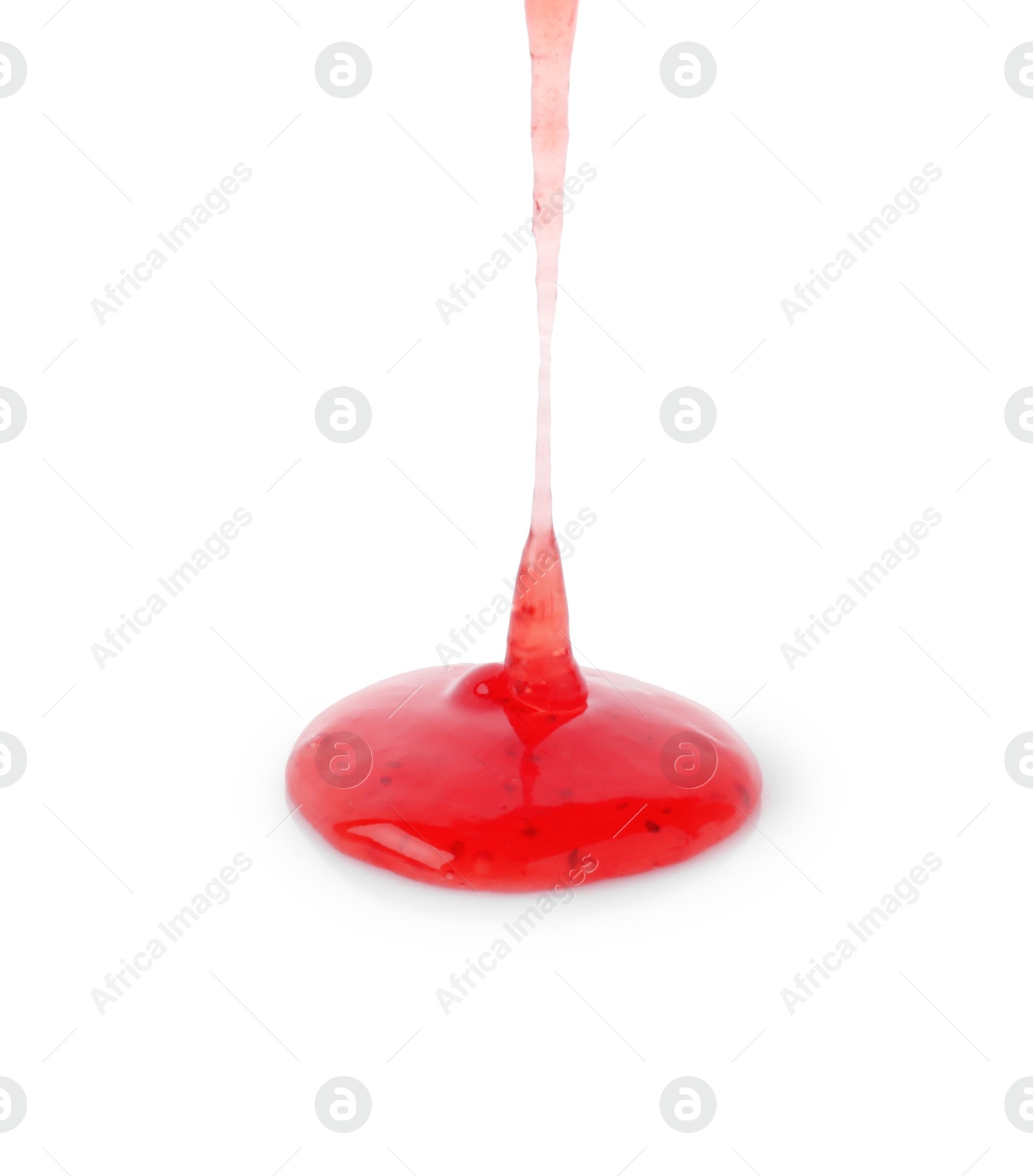 Photo of Pouring delicious strawberry sauce on white background, closeup