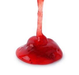 Photo of Pouring delicious strawberry sauce on white background, closeup