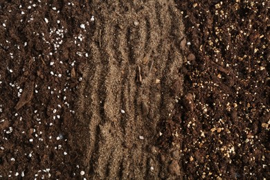 Photo of Texture of fresh soil as background, closeup