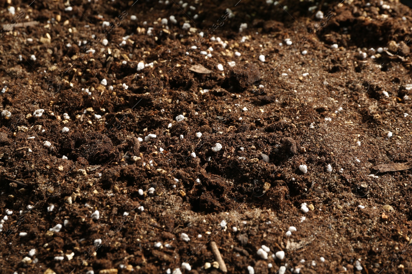 Photo of Texture of fresh soil as background, closeup