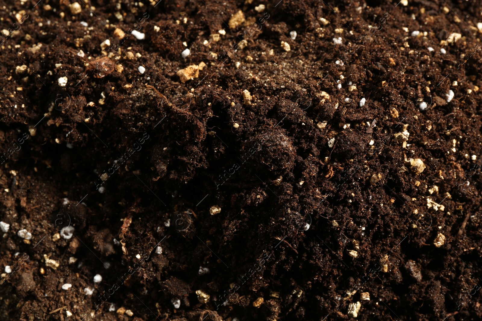 Photo of Texture of fresh soil as background, closeup