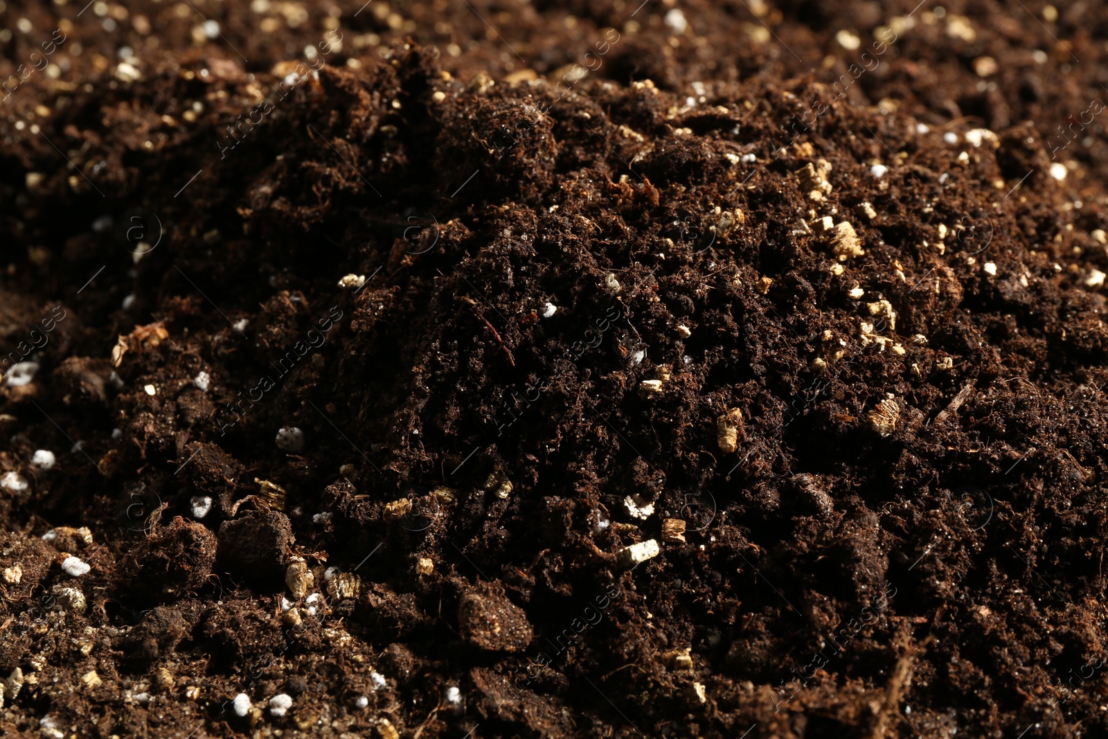 Photo of Texture of fresh soil as background, closeup