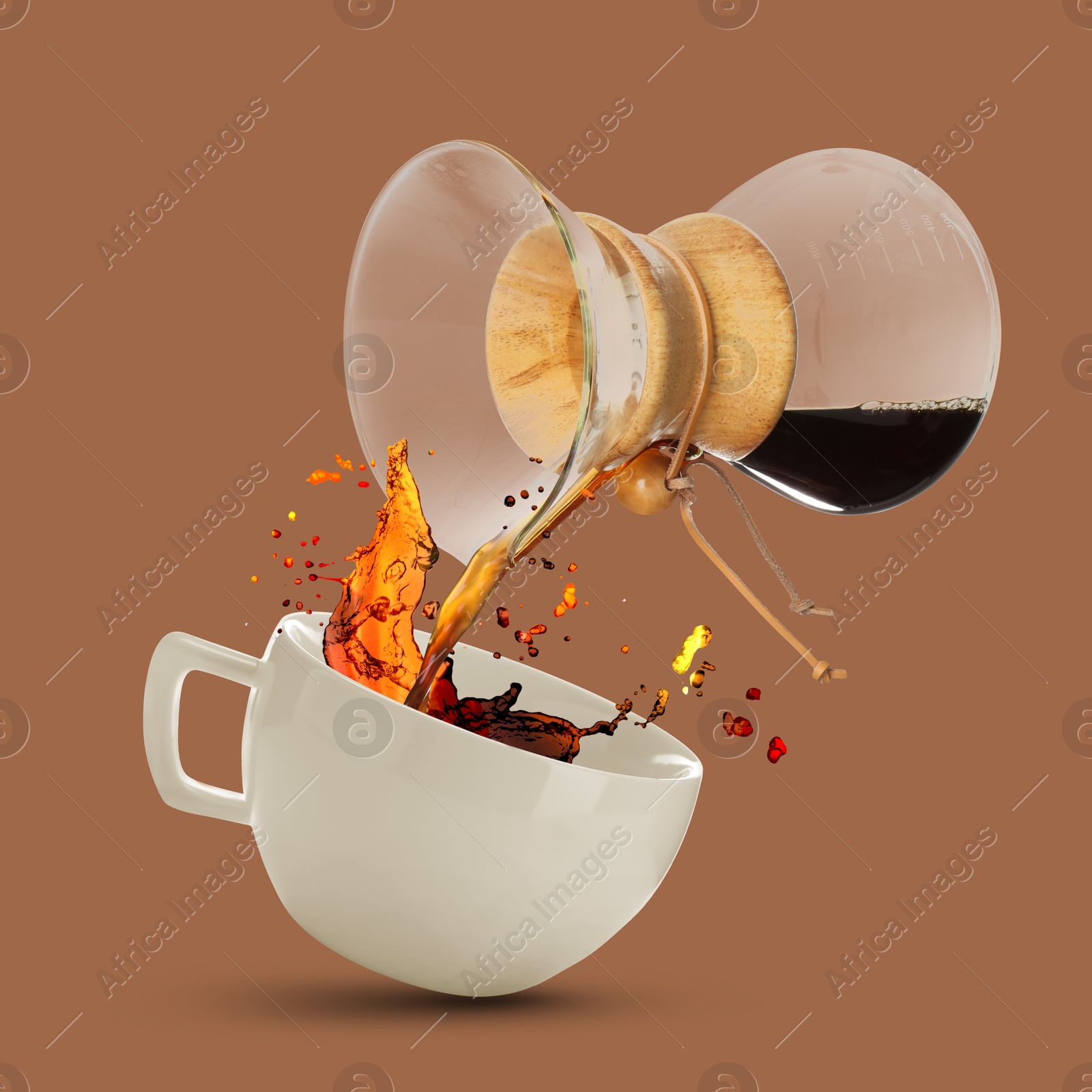 Image of Pouring freshly brewed coffee from glass coffeemaker into cup on pale brown background