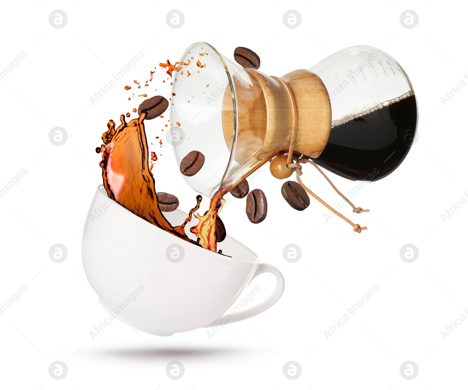 Image of Pouring freshly brewed coffee from glass coffeemaker into cup on white background