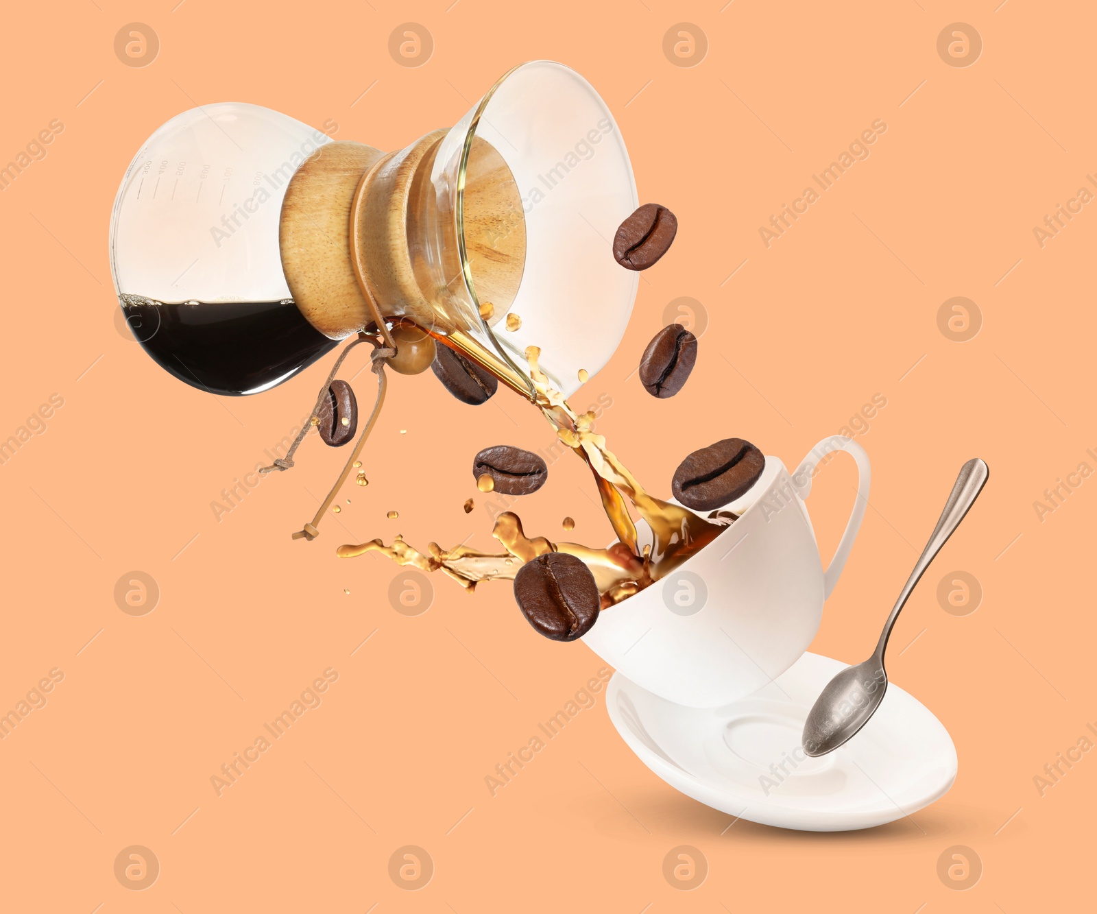 Image of Pouring freshly brewed coffee from glass coffeemaker into cup on pink beige background