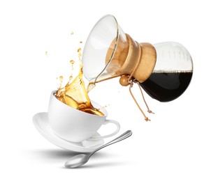 Image of Pouring freshly brewed coffee from glass coffeemaker into cup on white background