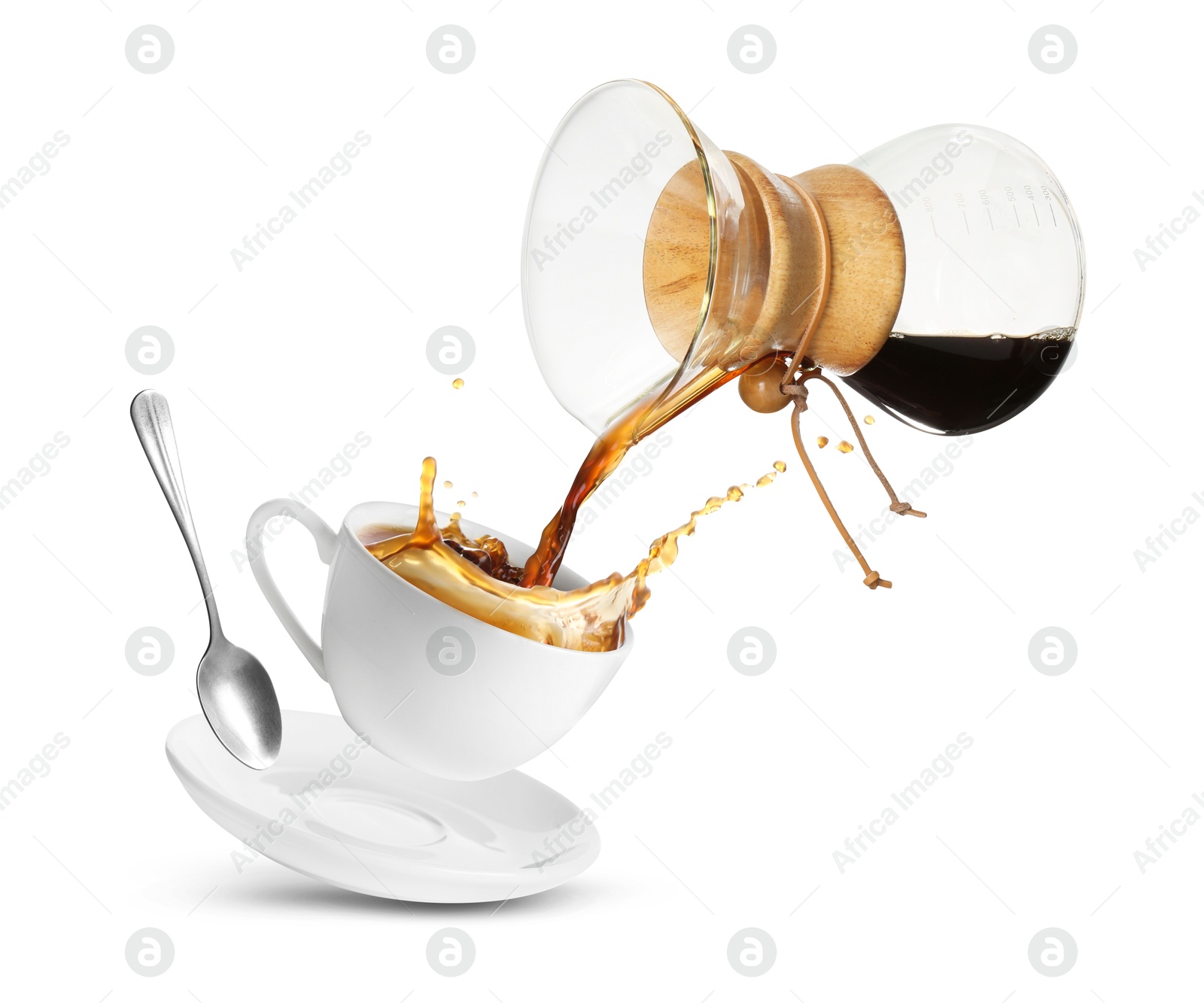 Image of Pouring freshly brewed coffee from glass coffeemaker into cup on white background