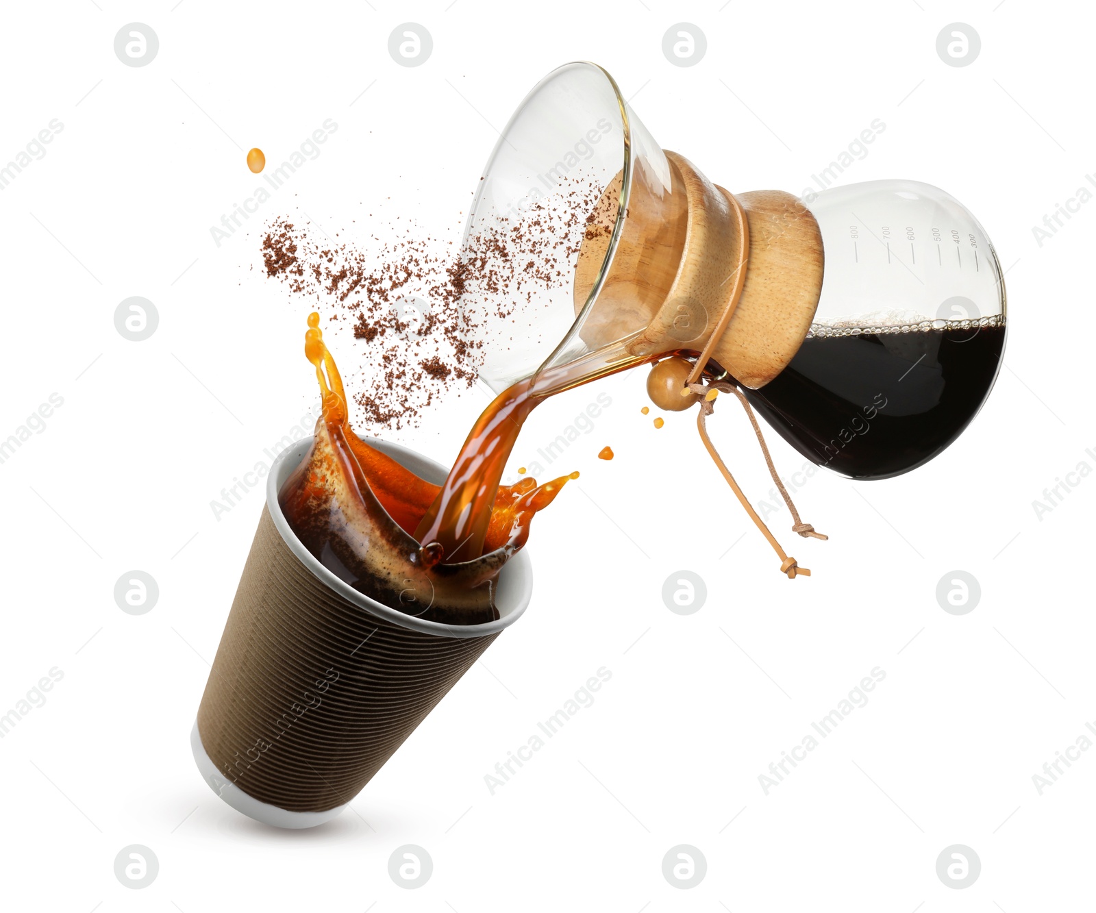 Image of Pouring freshly brewed coffee from glass coffeemaker into take-away paper cup on white background