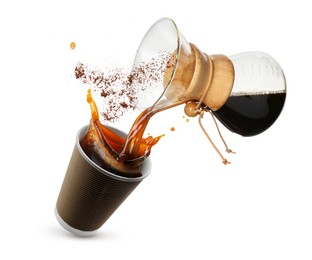 Image of Pouring freshly brewed coffee from glass coffeemaker into take-away paper cup on white background