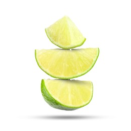 Image of Fresh lime slices falling on white background