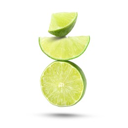 Image of Fresh lime slices falling on white background