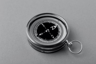 Image of Compass on table, closeup. Toned in black-and-white