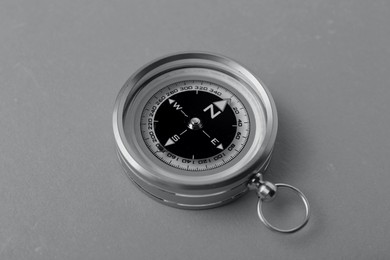 Image of Compass on table, closeup. Toned in black-and-white