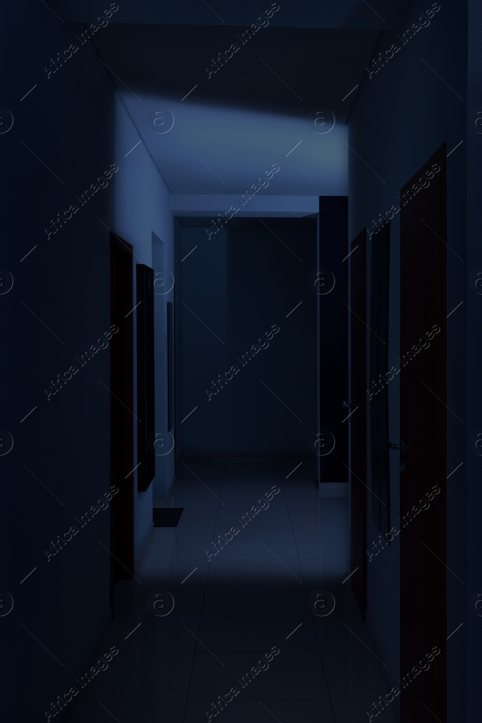 Image of Dark empty corridor in hospital or office building at night