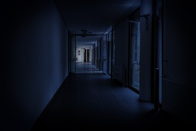 Image of Dark empty corridor in hospital at night