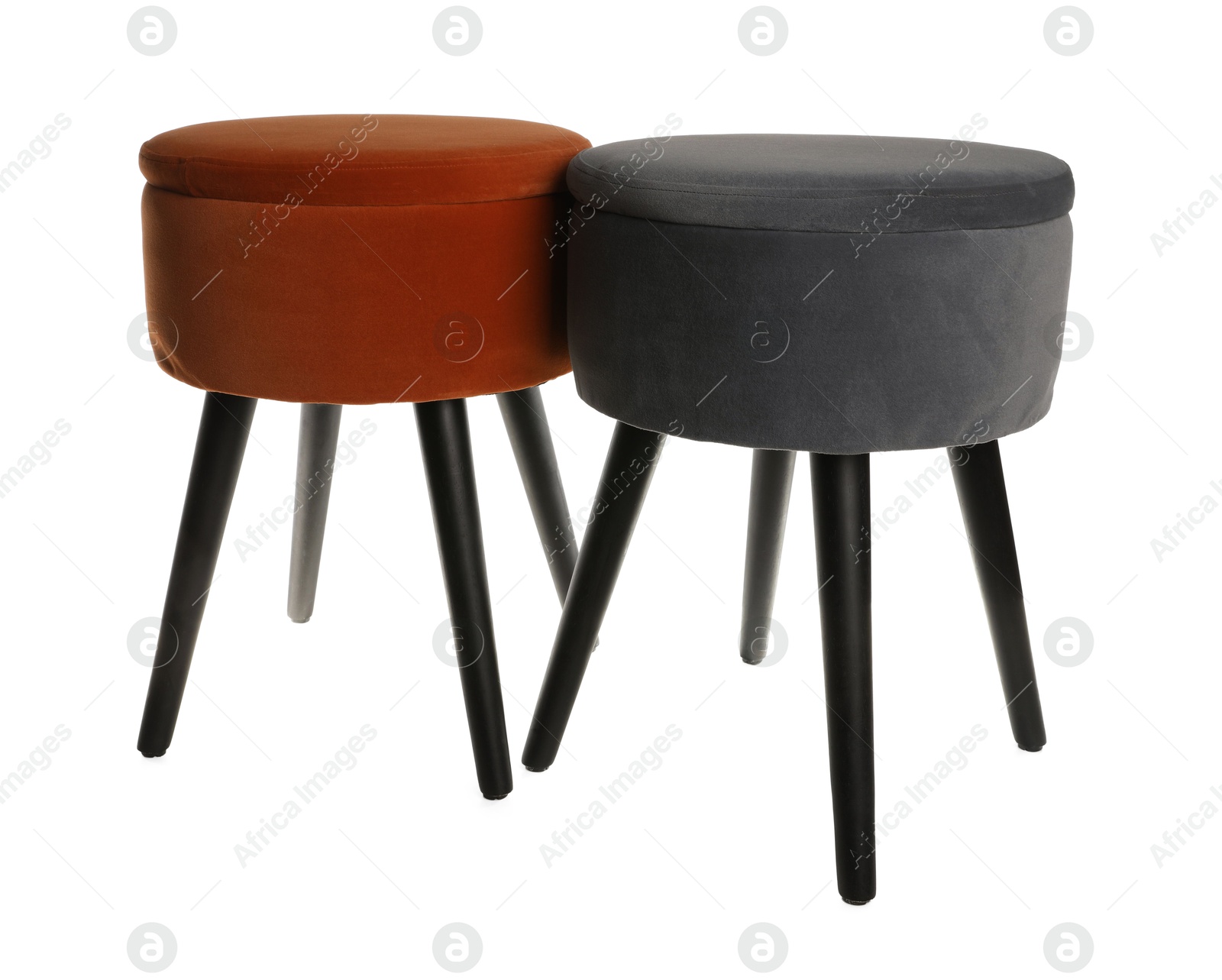 Photo of Different stylish velvet stools on white background