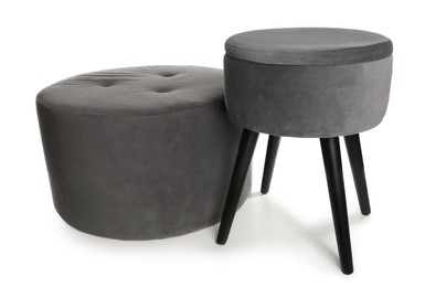 Photo of Stylish grey velvet stool and ottoman on white background