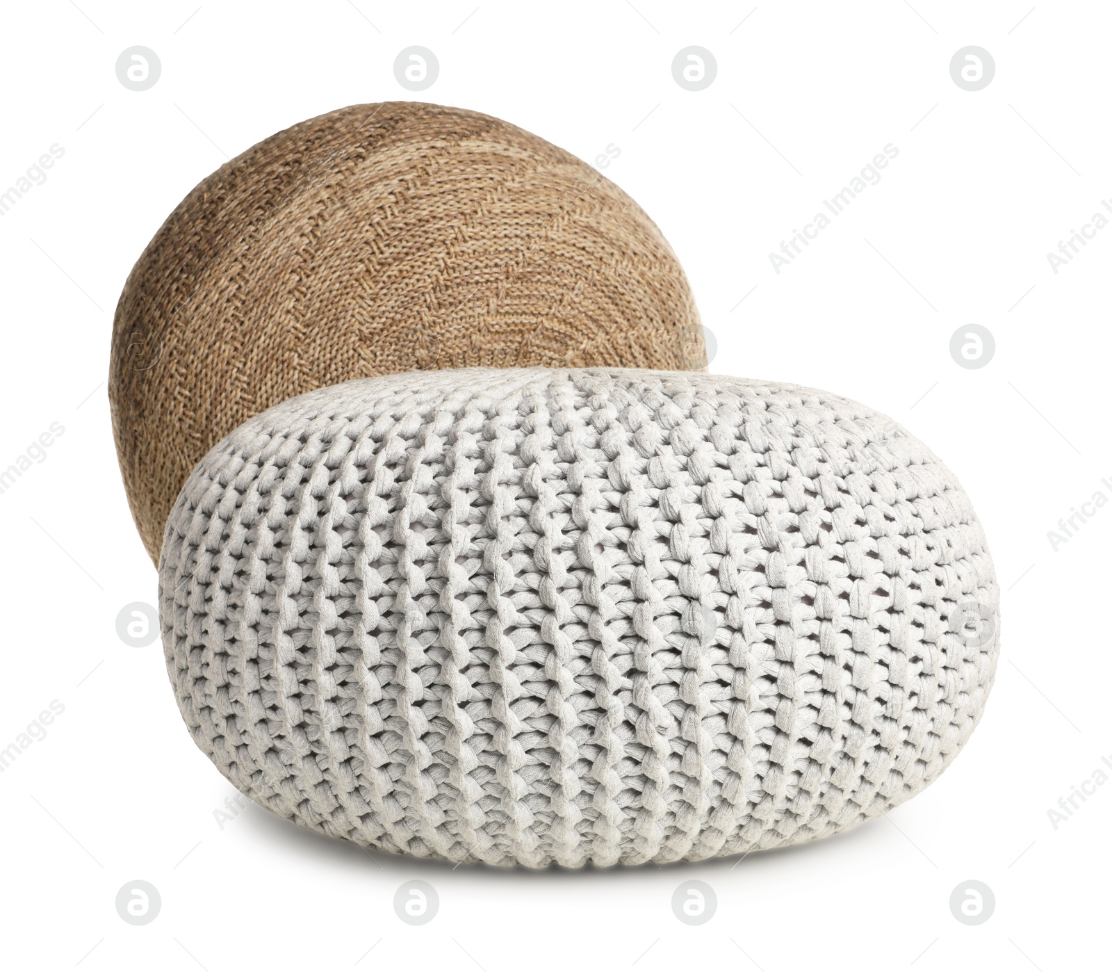 Photo of Different stylish knitted poufs on white background