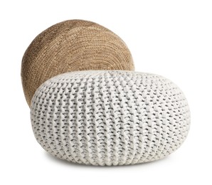 Photo of Different stylish knitted poufs on white background