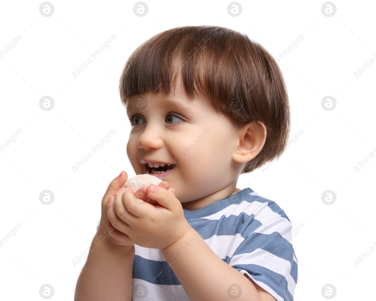 Photo of Cute little child eating tasty mochi on white background