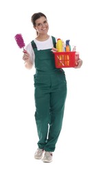 Photo of Smiling cleaning service worker with supplies on white background