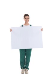 Photo of Smiling cleaning service worker with sheet of paper on white background. Space for text