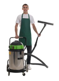 Photo of Smiling cleaning service worker with vacuum cleaner on white background