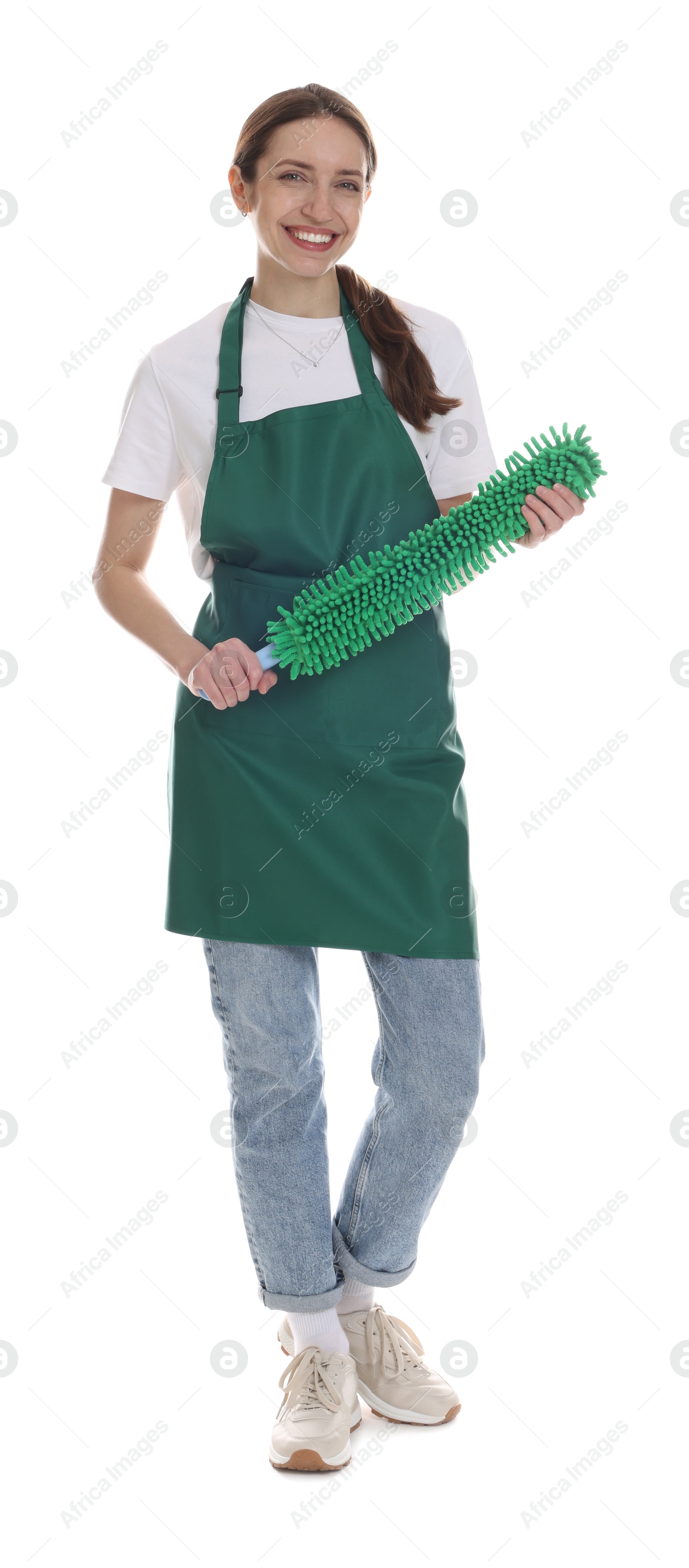 Photo of Smiling cleaning service worker with dusting brush on white background