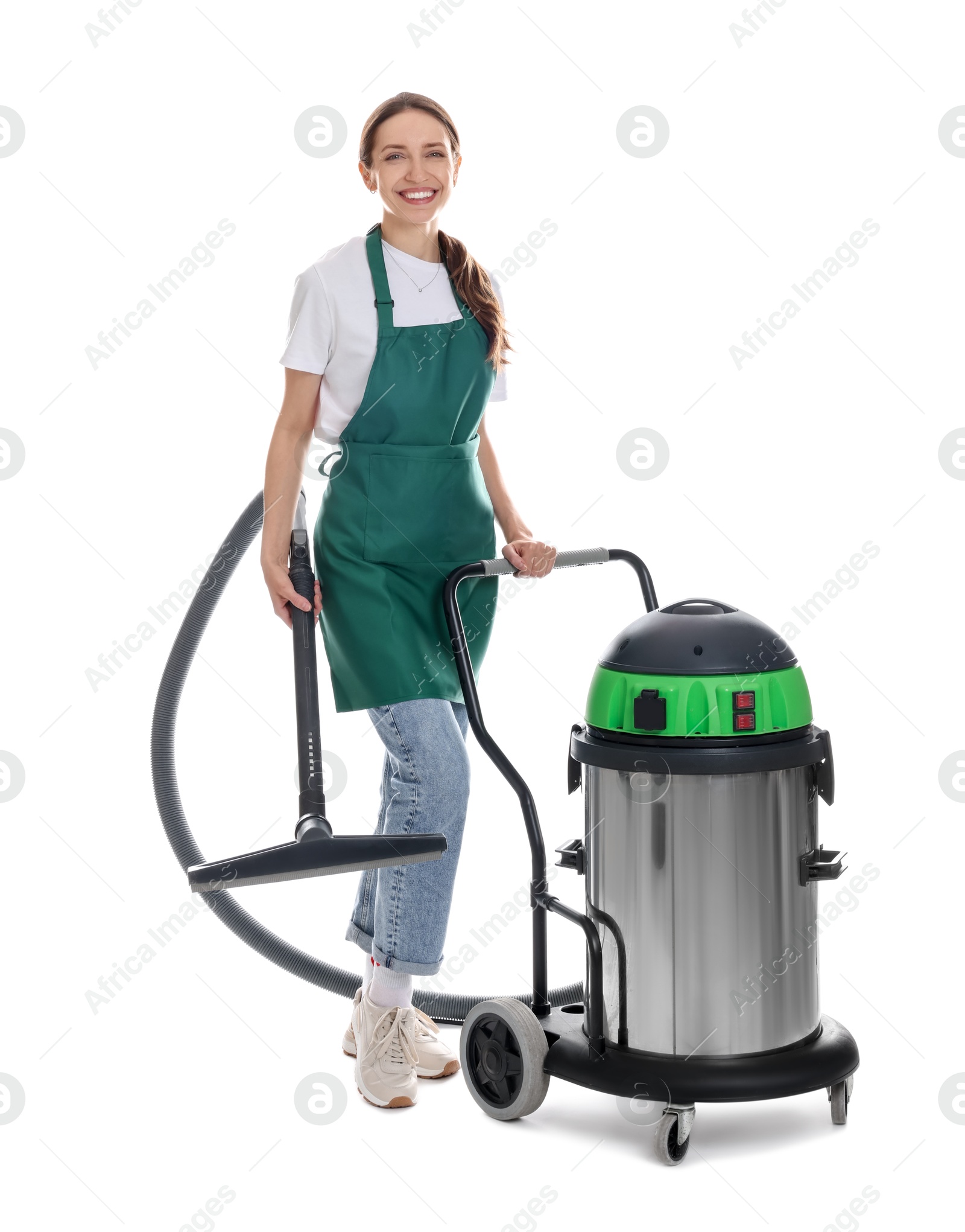 Photo of Smiling cleaning service worker with vacuum cleaner on white background