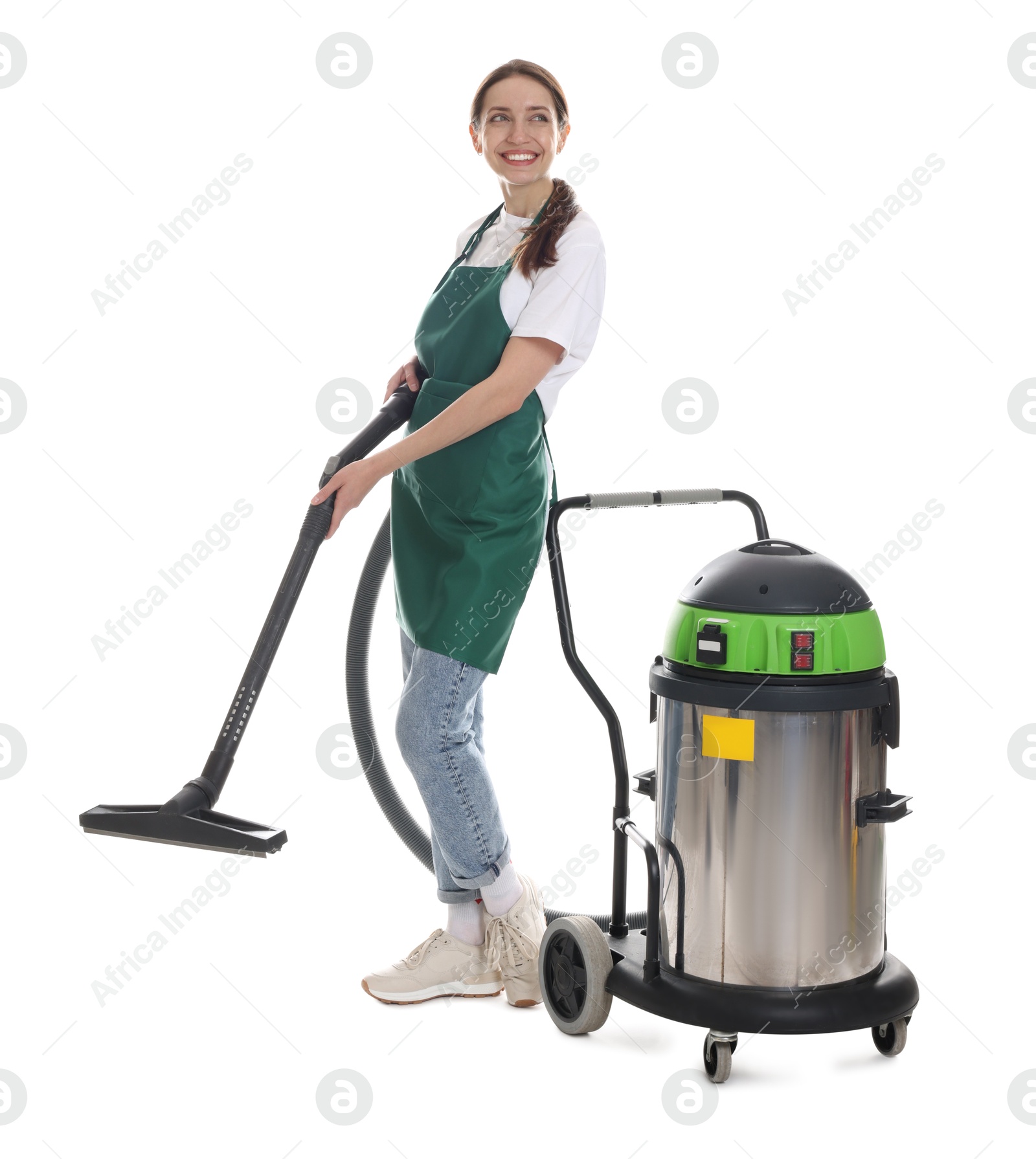 Photo of Smiling cleaning service worker with vacuum cleaner on white background