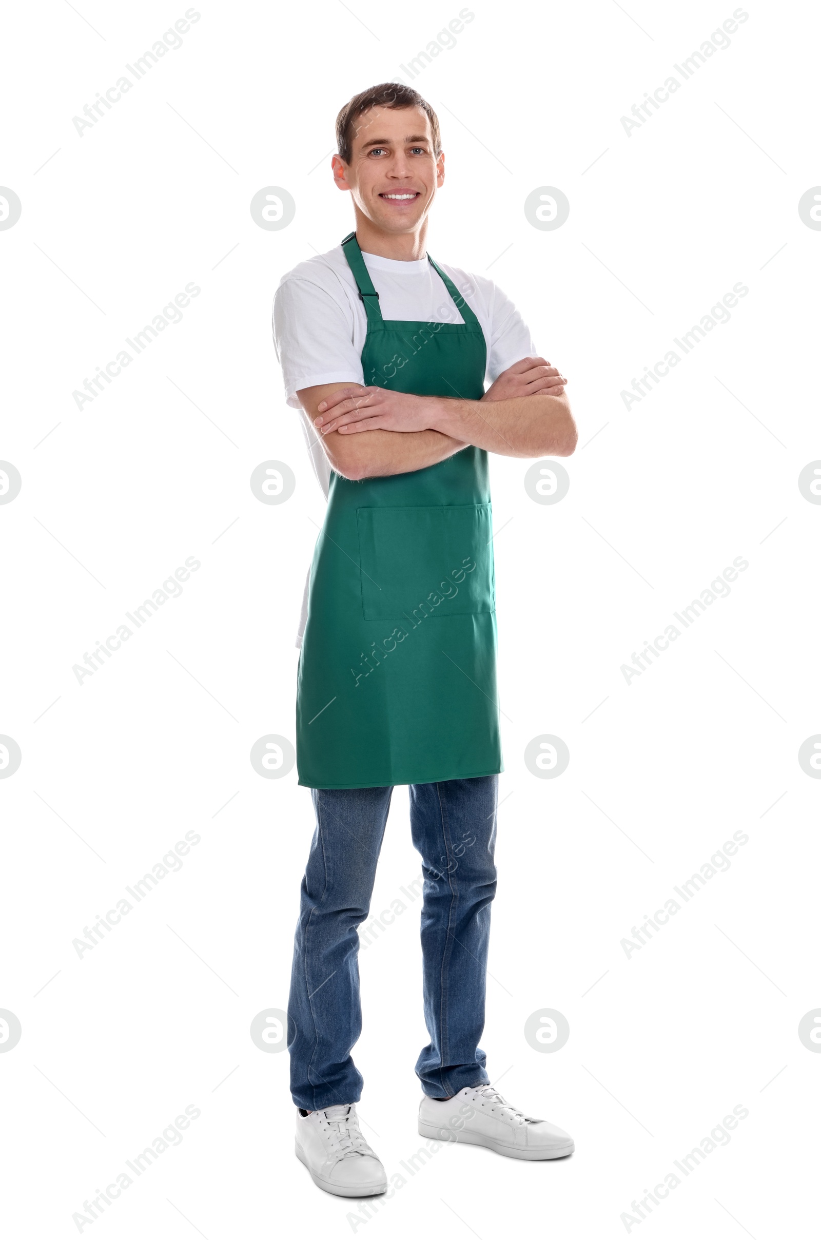 Photo of Smiling cleaning service worker with crossed arms on white background