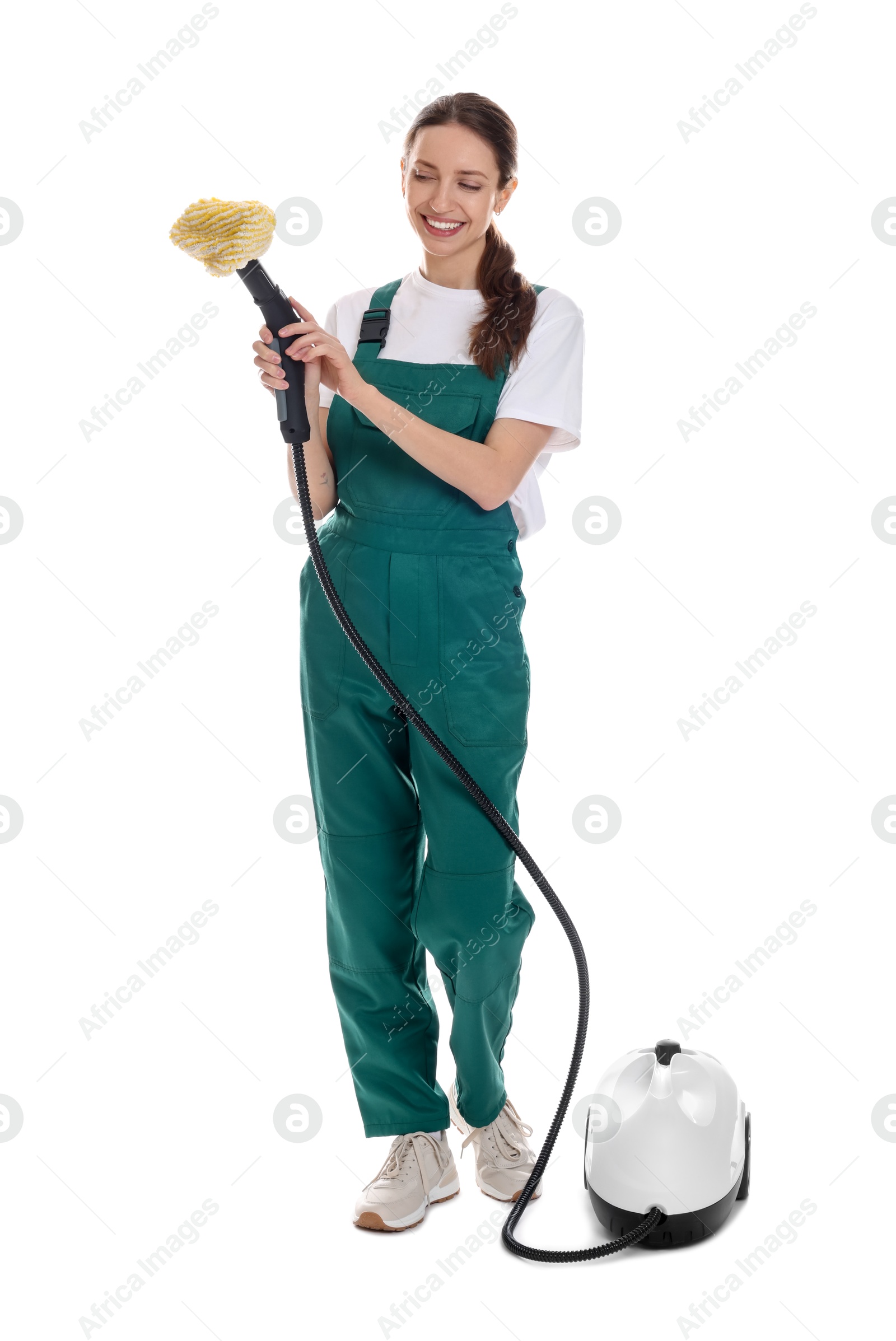 Photo of Smiling cleaning service worker with steam cleaner on white background