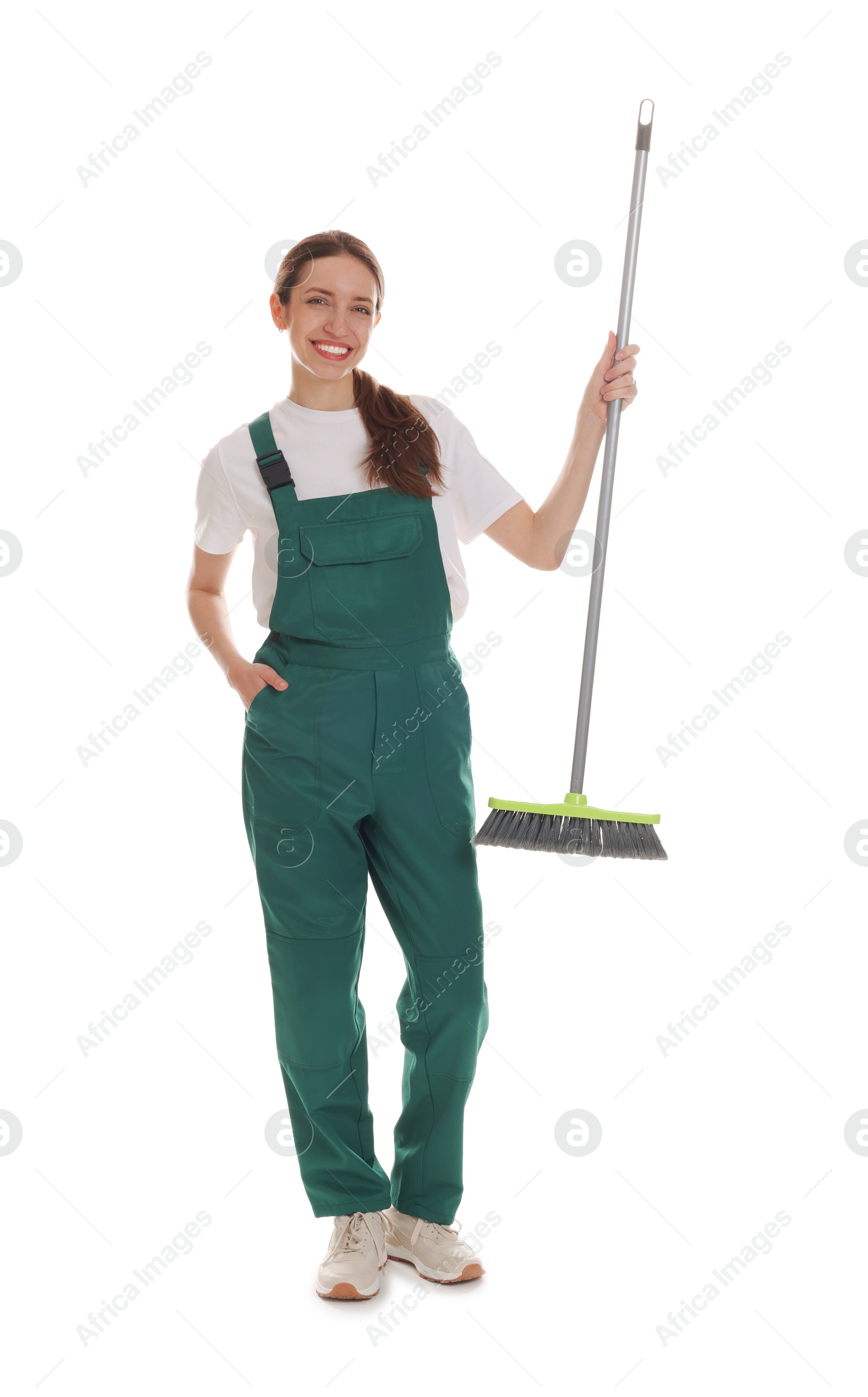 Photo of Smiling cleaning service worker with broom on white background