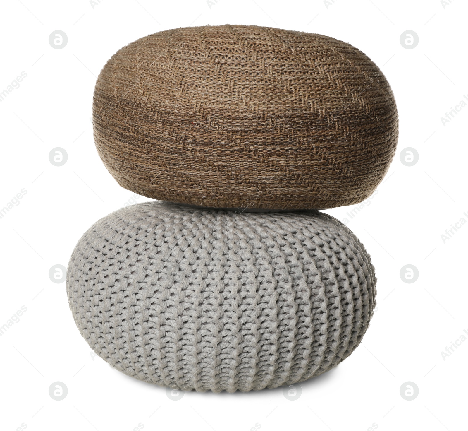 Photo of Different stylish knitted poufs on white background