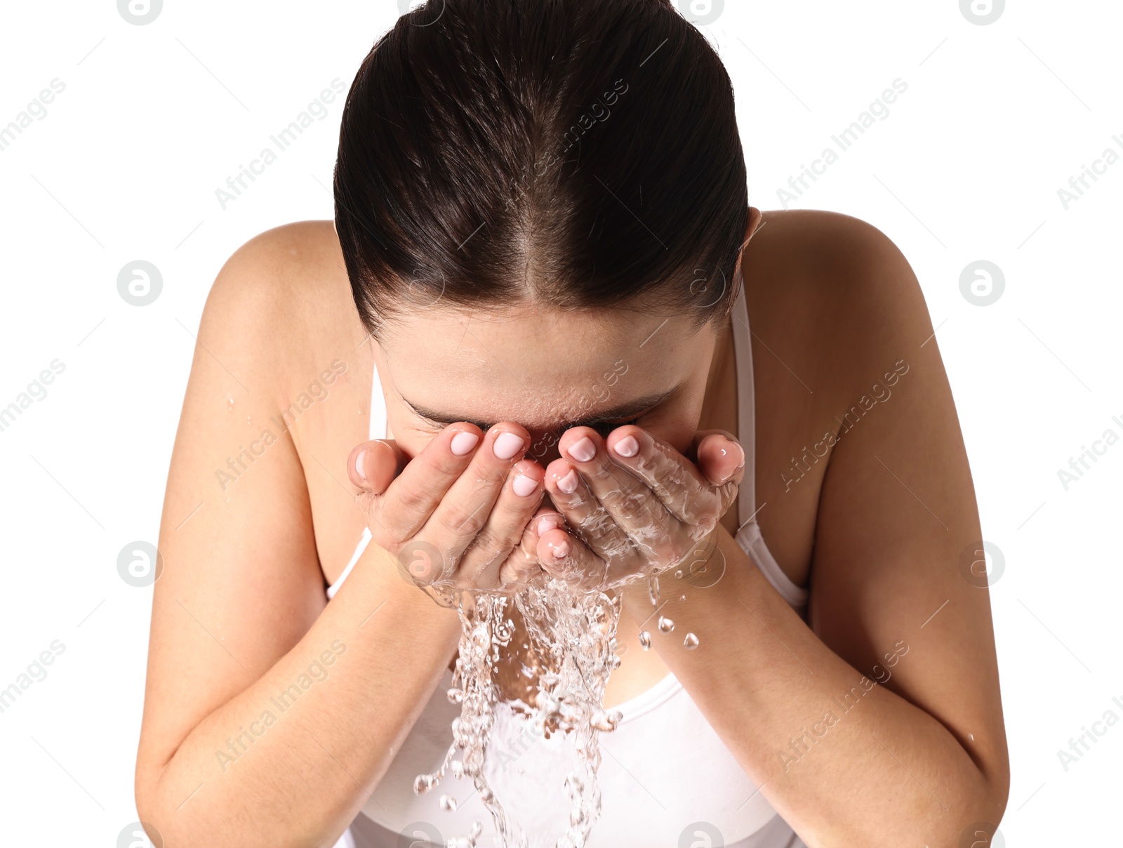 Photo of Woman washing her face on white background