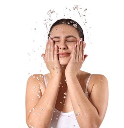 Photo of Attractive woman washing her face on white background