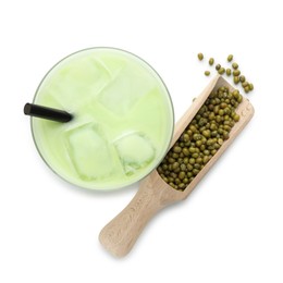 Photo of Fresh mung bean juice in glass, scoop and seeds isolated on white, top view
