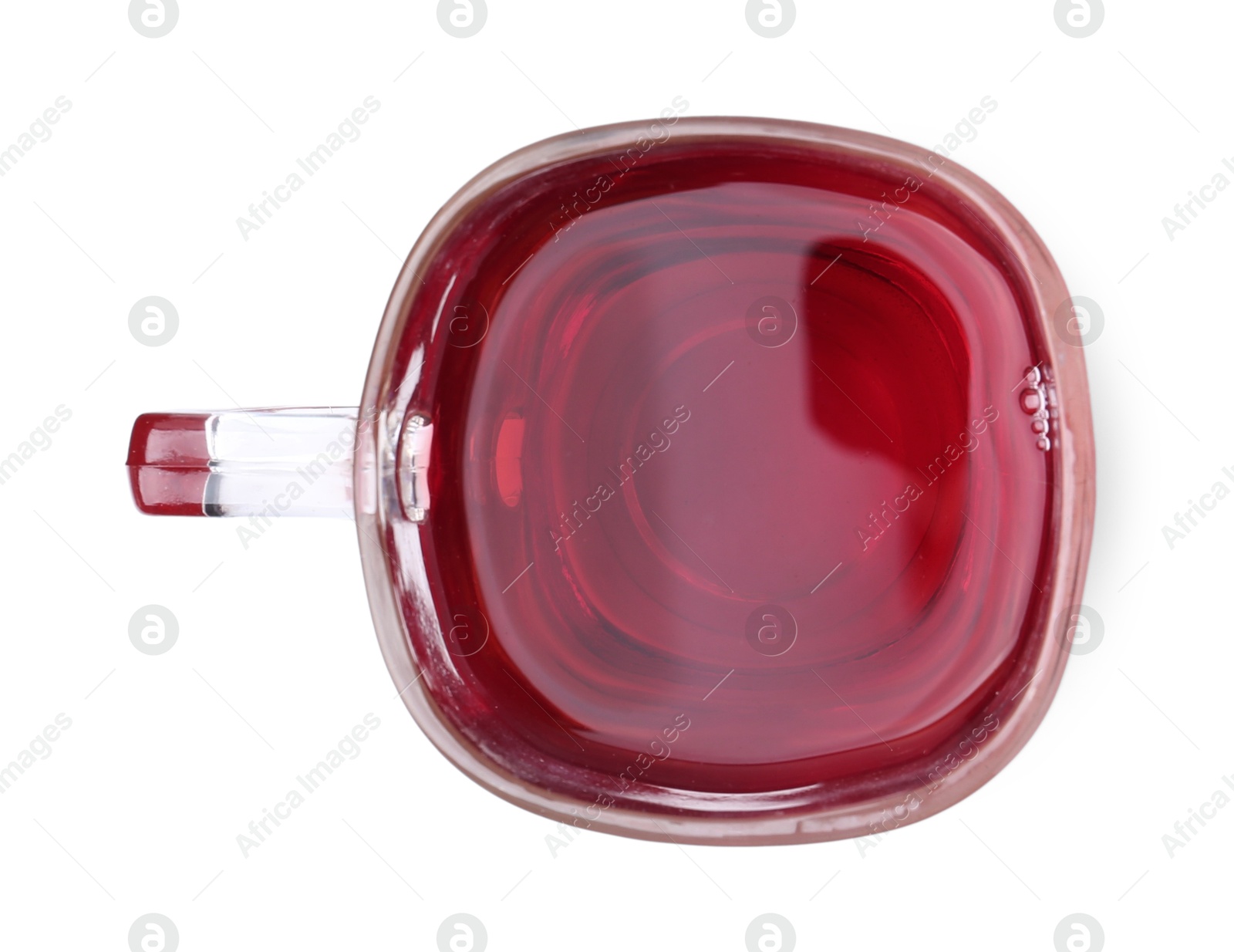 Photo of Delicious hibiscus tea in glass cup isolated on white, top view