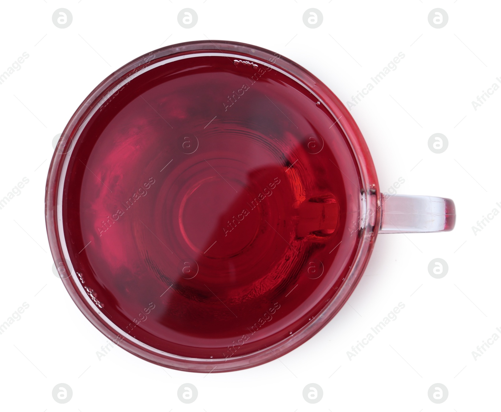 Photo of Delicious hibiscus tea in glass cup isolated on white, top view