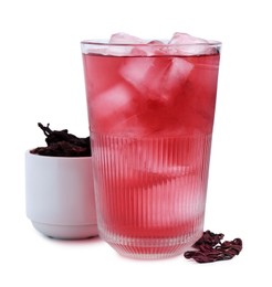 Photo of Delicious hibiscus tea with ice in glass and dry roselle sepals isolated on white