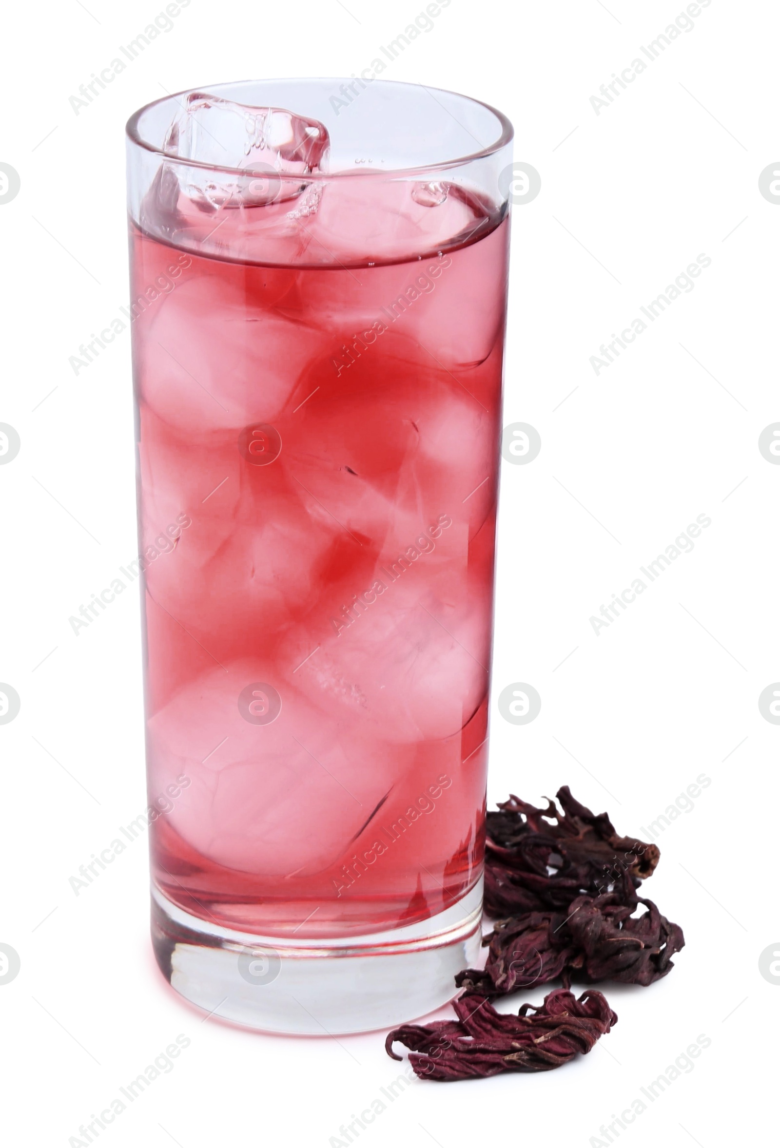 Photo of Delicious hibiscus tea with ice in glass and dry roselle sepals isolated on white