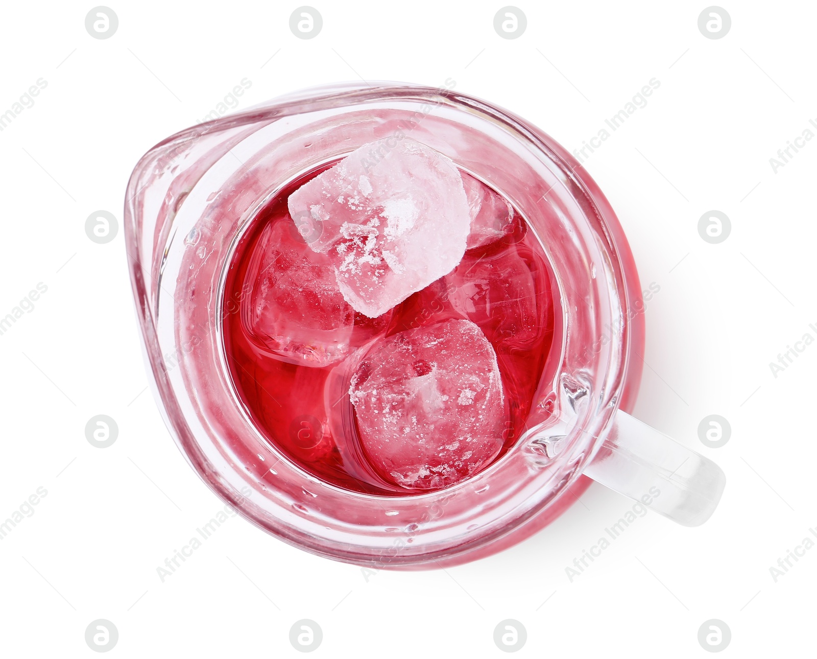 Photo of Delicious hibiscus tea with ice in glass jug isolated on white, top view