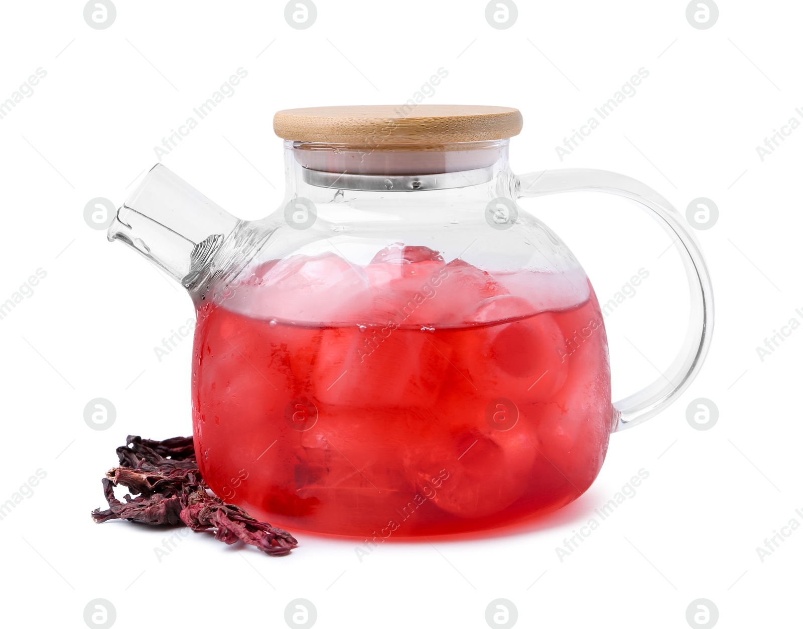 Photo of Delicious hibiscus tea with ice in teapot and dry roselle sepals isolated on white