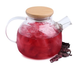 Photo of Delicious hibiscus tea with ice in teapot and dry roselle sepals isolated on white