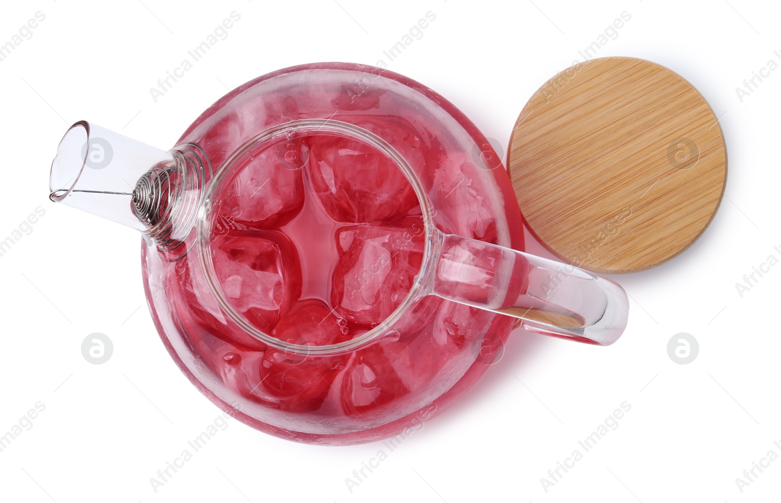 Photo of Delicious hibiscus tea with ice in teapot isolated on white, top view